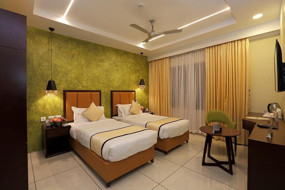 Hotel New York Square Kottayam Luaran gambar