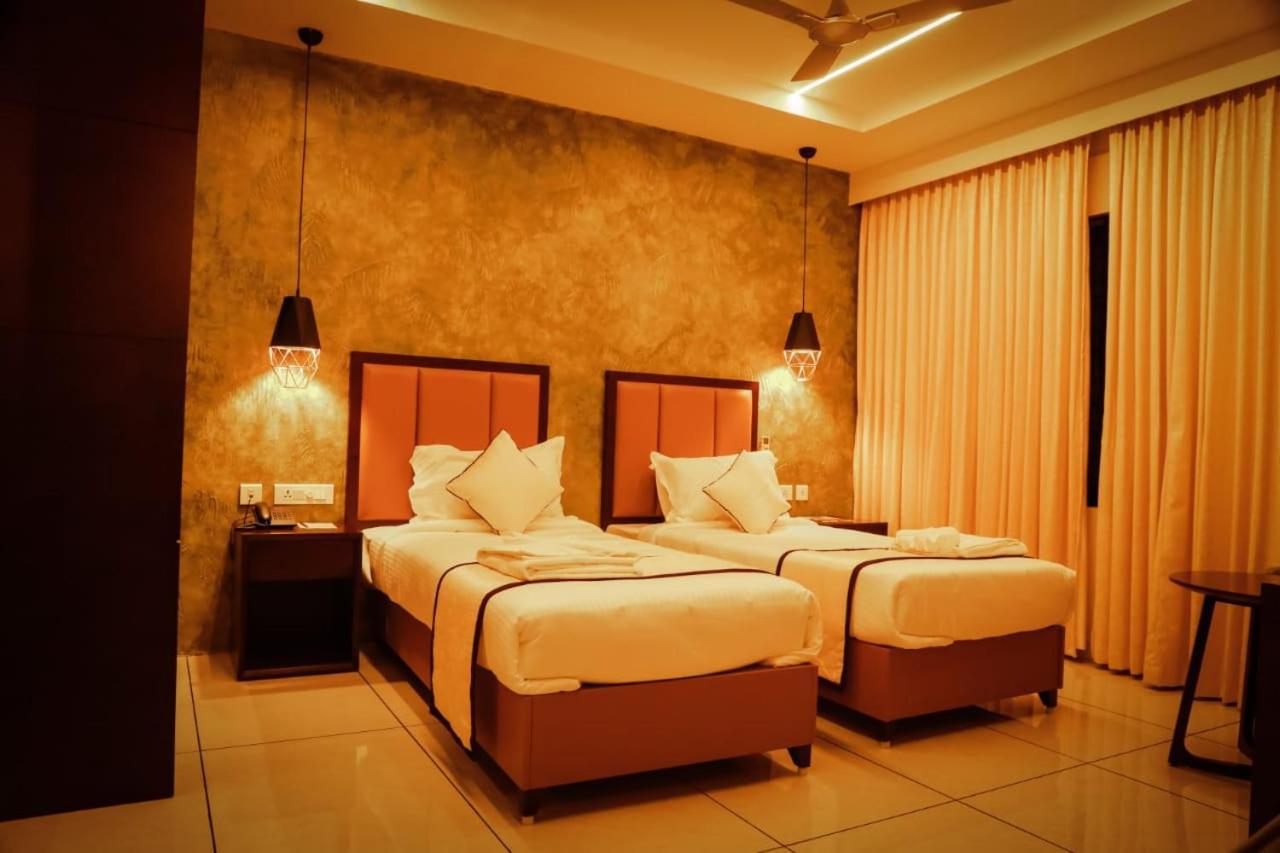 Hotel New York Square Kottayam Luaran gambar